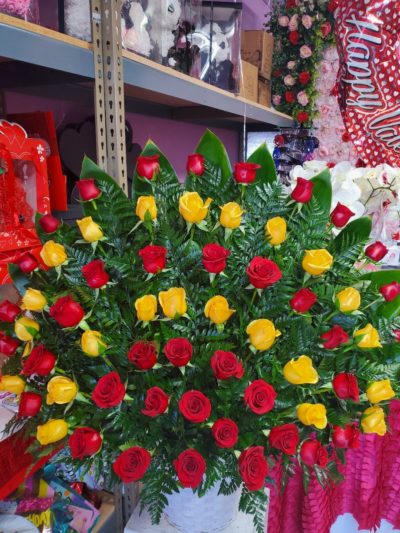 yellow red rose arrangement